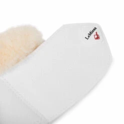 LeMieux Lambswool Overreach Boots 21 LeMieux Lambswool Overreach Boots -Equestrian Supplie Store lambswool bell boot white strap lemieux 73312.1638568731
